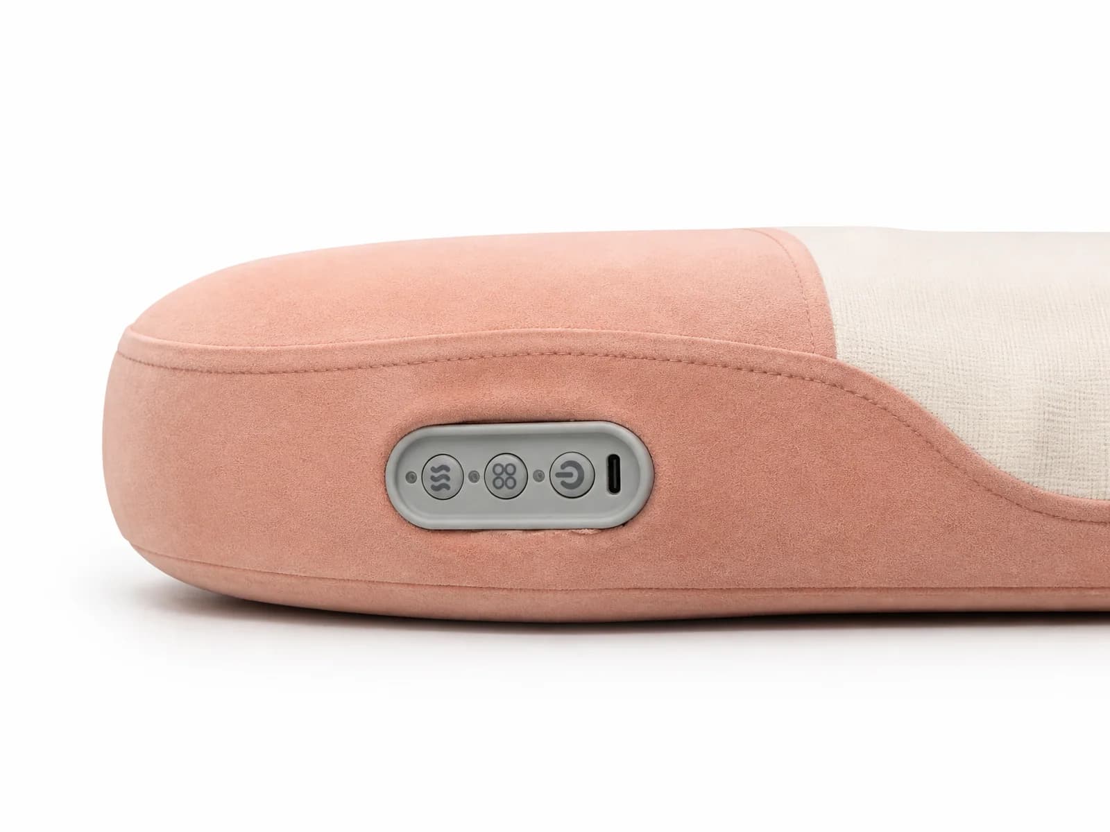 Side-profile view showing embedded waterproof silicone control panel on the lateral pillow border