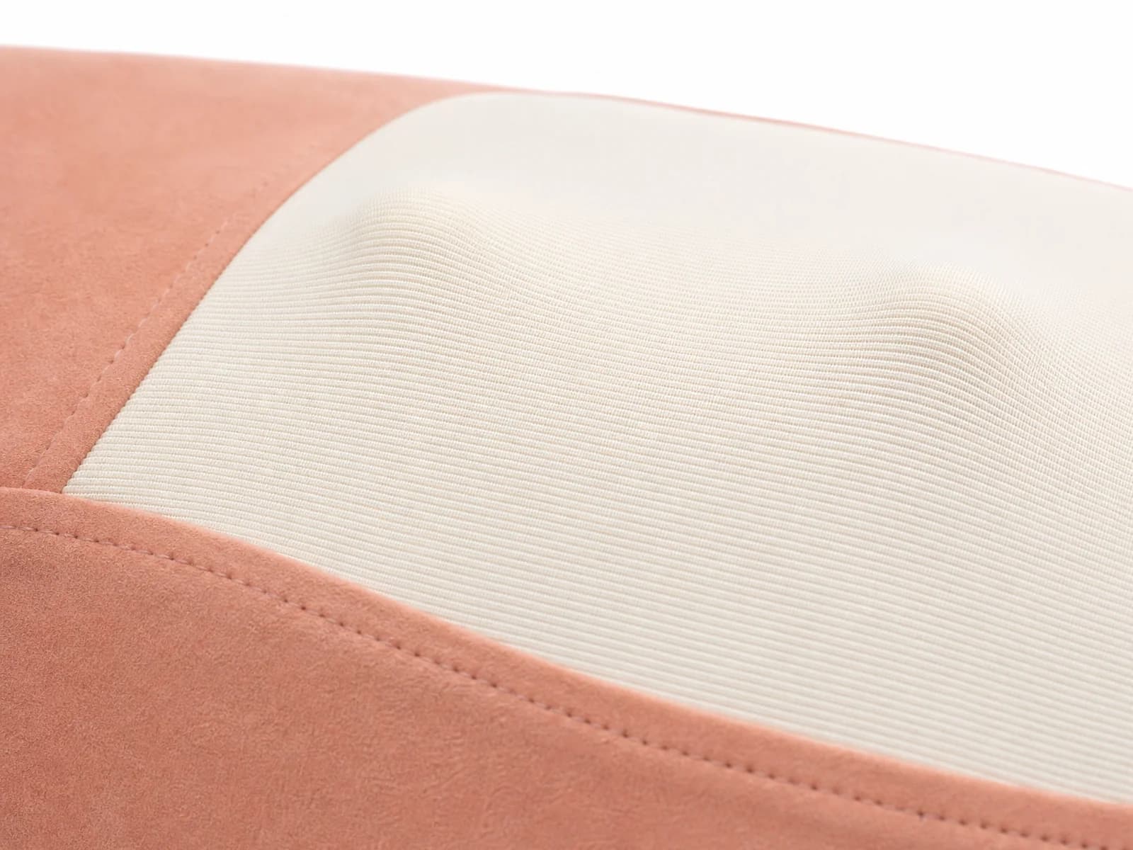 Macro close-up of the breathable elastic mesh surface covering the internal rotating kneading heads