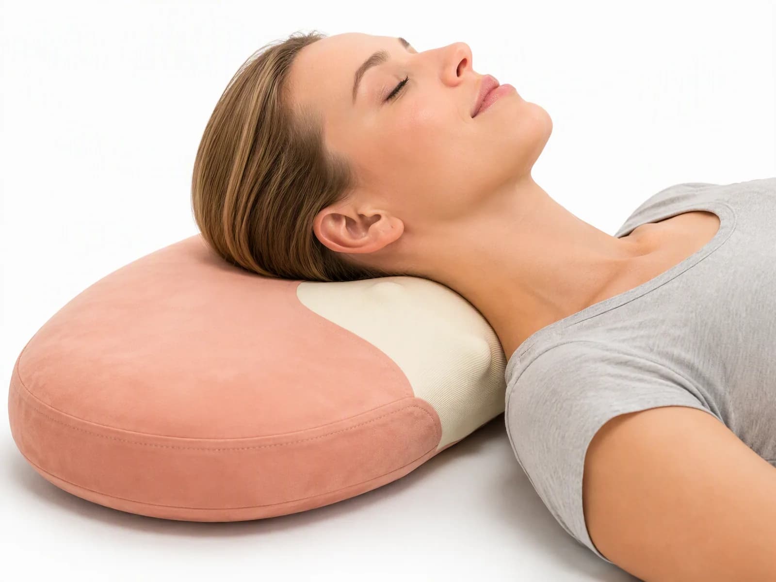 Woman lying comfortably on bed with neck resting naturally against the JMZ-CSPL002 kneading cushion